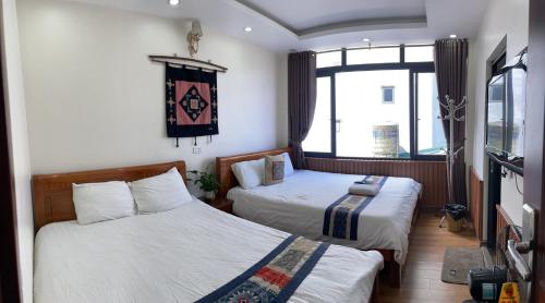 Katil atau katil-katil dalam bilik di TuongMai Home & Trekking Tour