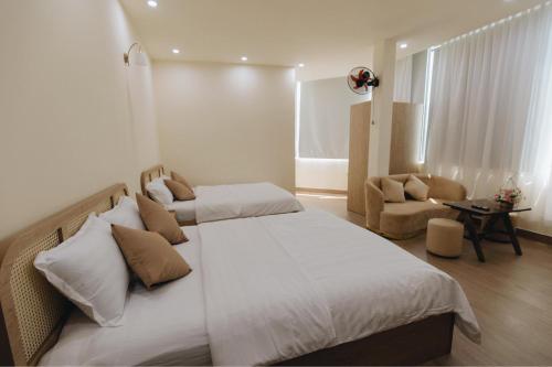 Katil atau katil-katil dalam bilik di Minh Anh Homestay