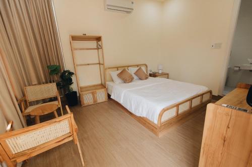 Katil atau katil-katil dalam bilik di Minh Anh Homestay
