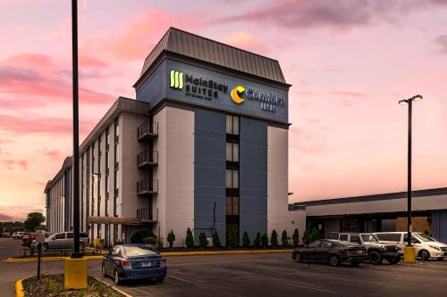 a building with a sign on the side of it at MainStay Suites MSP Airport - Mall of America in Bloomington