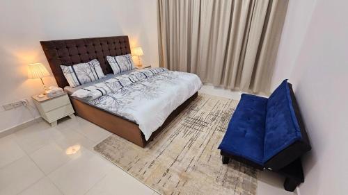 Postel nebo postele na pokoji v ubytování Deluxe Villa Rooms near Dubai Airport