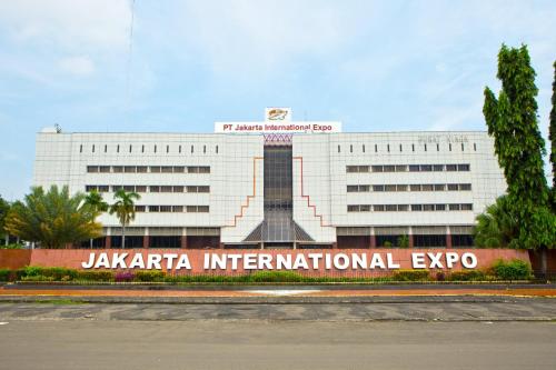 a jaxapa international expo building with a pyramid on it at Holiday Inn Express Jakarta International Expo by IHG in Jakarta