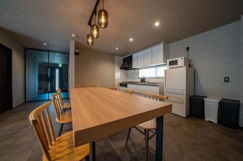 Kuchyň nebo kuchyňský kout v ubytování Lotus furano LUX-villa