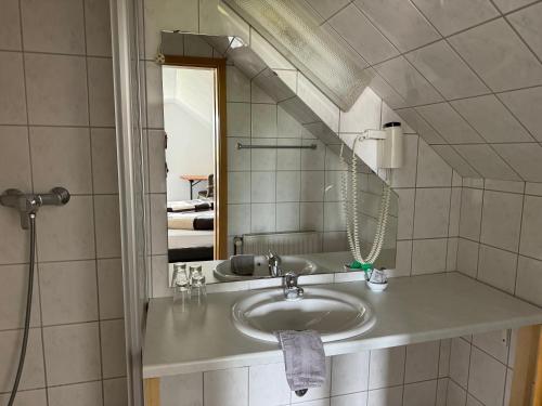 Koupelna v ubytování Bistro-zur-Quelle