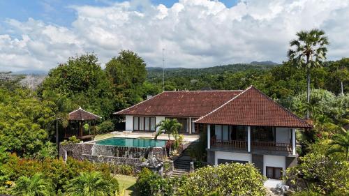 an image of a house with a swimming pool at Villa Ponjok Batu Residence in Bukti