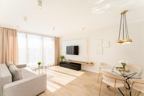 Televízia a/alebo spoločenská miestnosť v ubytovaní GA Luxury Apartments M45