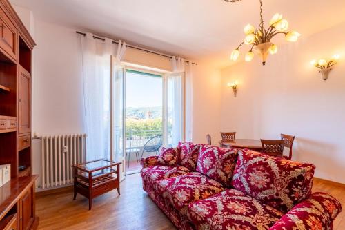 a living room with a couch and a table at Spring Apartment by Wonderful Italy in Como