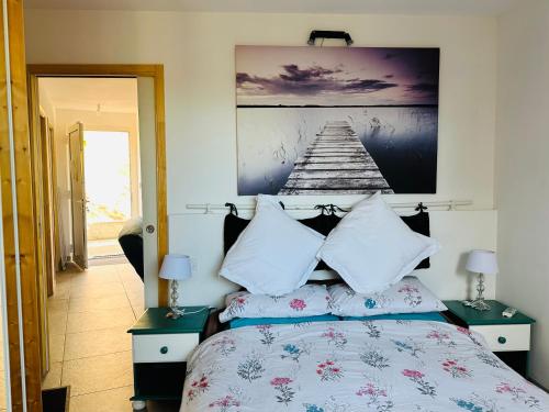 Ένα ή περισσότερα κρεβάτια σε δωμάτιο στο Moderne Mini Maison - Quartier Résidentiel Calme