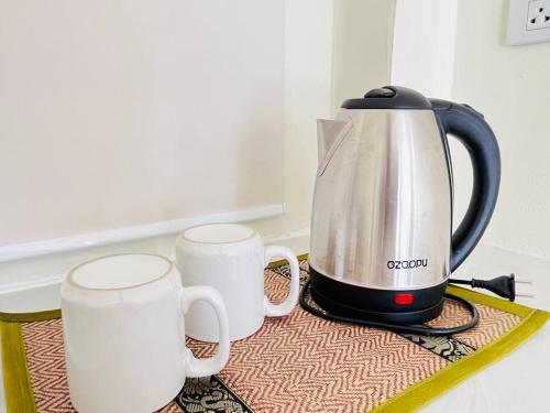 Příslušenství pro přípravu čaje a kávy v ubytování Coco Healing 2