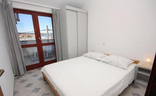 Posteľ alebo postele v izbe v ubytovaní Apartments Vala