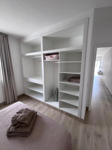 Llit o llits en una habitació de Apartamento Piscis