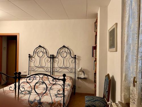 Ένα ή περισσότερα κρεβάτια σε δωμάτιο στο Casa Adriana