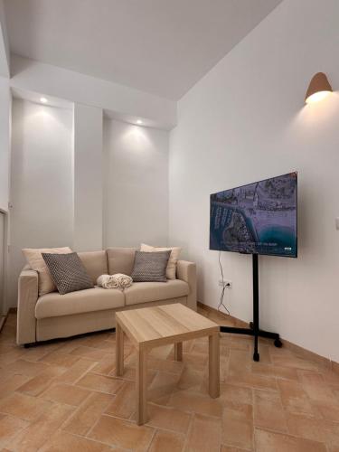 TV a/nebo společenská místnost v ubytování Apartamento mediterráneo