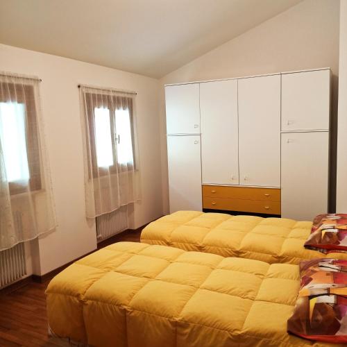 Cama o camas de una habitación en B&B Casagrande