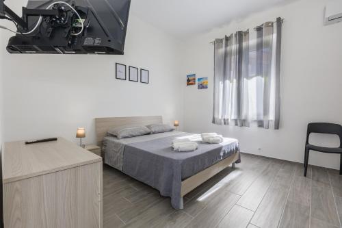 Postel nebo postele na pokoji v ubytování Casa Gioiosa Holidays
