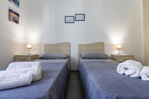 Postel nebo postele na pokoji v ubytování Casa Gioiosa Holidays