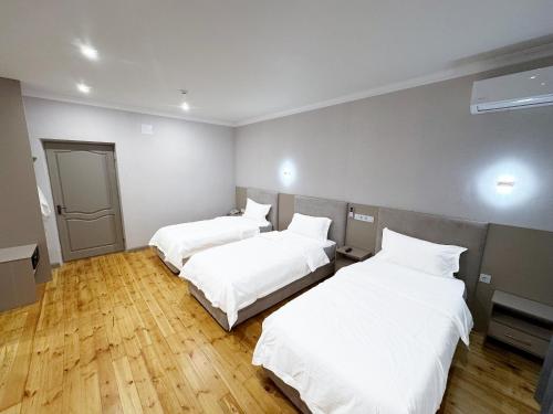 Green Hotelにあるベッド