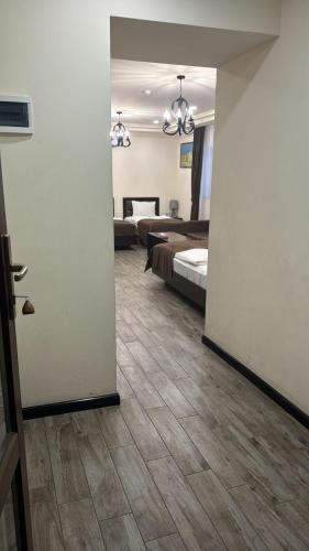Katil atau katil-katil dalam bilik di Boutique Living Hotel