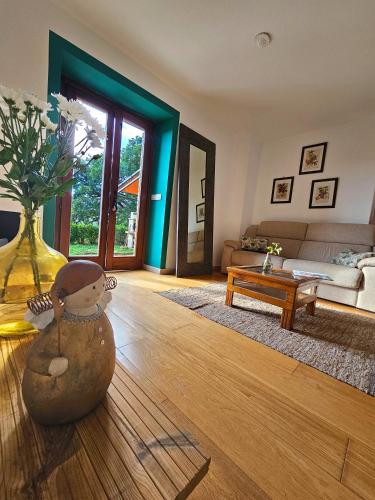 a living room with a snowman sitting on the floor at Villa delle lucciole in Massa Martana