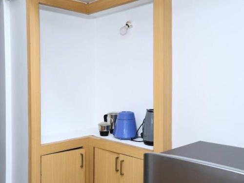Kuchyň nebo kuchyňský kout v ubytování Comfort Residency