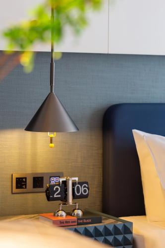 Galería fotográfica de Anbo M Hotel Yiwu Wanda Plaza en Yiwu