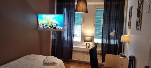 Postel nebo postele na pokoji v ubytování Hotell Västerås