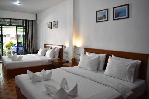 Katil atau katil-katil dalam bilik di Sala Bua Room