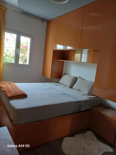 Postel nebo postele na pokoji v ubytování Dar redouane