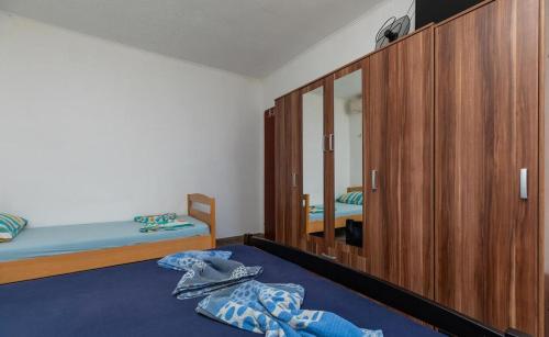Postel nebo postele na pokoji v ubytování Apartments Duro