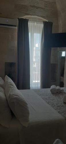 Postel nebo postele na pokoji v ubytování B&B Giada&Chiara