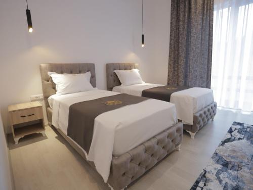 Cama o camas de una habitación en Shatri Hotel