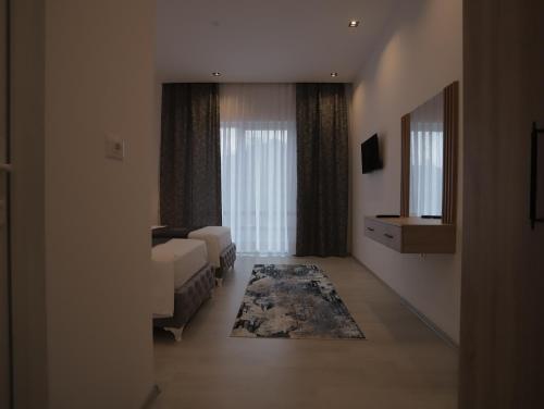 Cama o camas de una habitación en Shatri Hotel