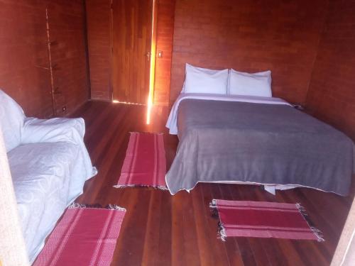 Postel nebo postele na pokoji v ubytování Cabanas Mountain