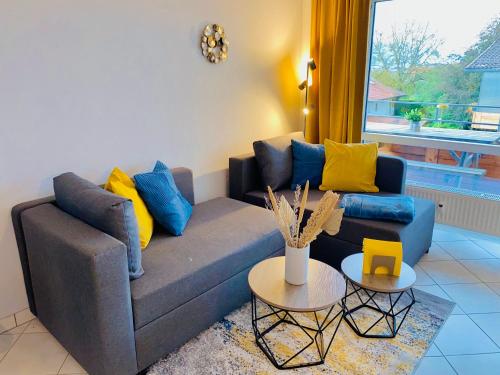 Posezení v ubytování Apartment Krautinsel mit Seeblick