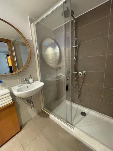 a bathroom with a shower and a sink at LaNova21 in Naples