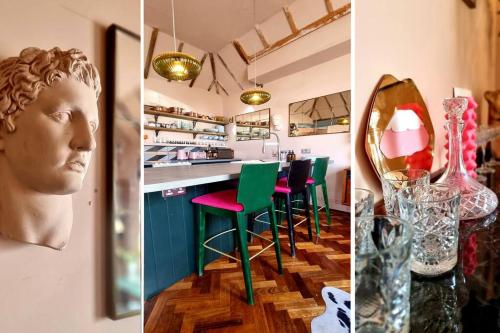 cocina con barra con taburetes verdes y barra en Stunning Sea View Penthouse, en Kent