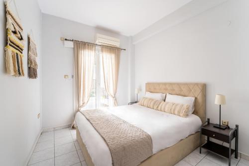 Posteľ alebo postele v izbe v ubytovaní Acropolis Boho Bliss