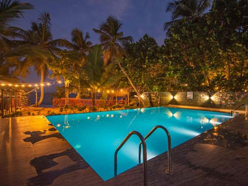 Бассейн в Frangipani Beach Villa или поблизости
