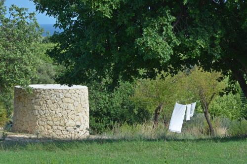 a towel hanging on a clothes line in a field at Villa Vendicari in Casa Maccari