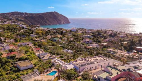 an aerial view of a city and the ocean at Villa Ravino Secret Retreat in Ischia
