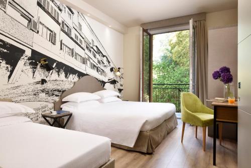Katil atau katil-katil dalam bilik di FH55 Med Executive Hotel