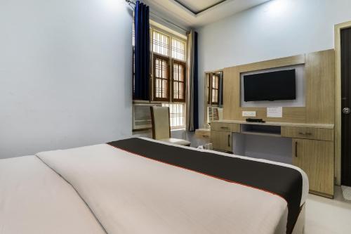 TV a/nebo společenská místnost v ubytování Super Hotel O Kiara Inn