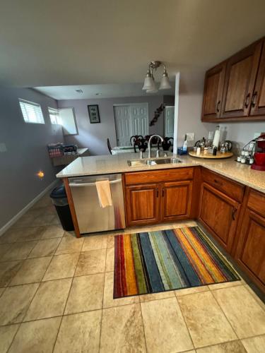 a kitchen with a sink and a counter top at Fenton Oasis in Fenton