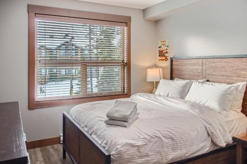 Ένα ή περισσότερα κρεβάτια σε δωμάτιο στο Stonegate Resort Unit B204