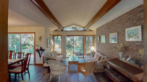 a living room with a couch and a table at DIXIES RETREAT home in Jekyll Island