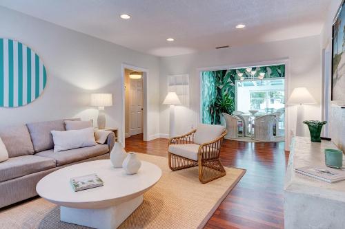 a living room with a couch and a table at Luxury Home in Brickell Miami, 5 min to the Beach! in Miami