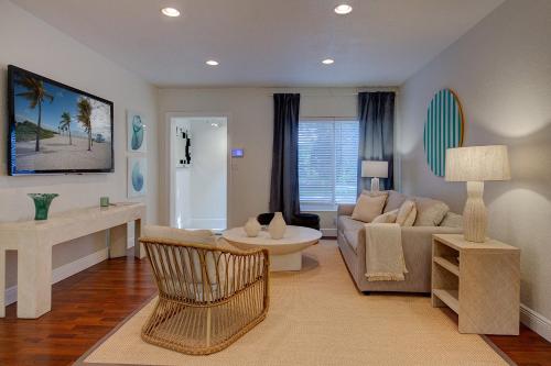 a living room with a couch and a table at Luxury Home in Brickell Miami, 5 min to the Beach! in Miami