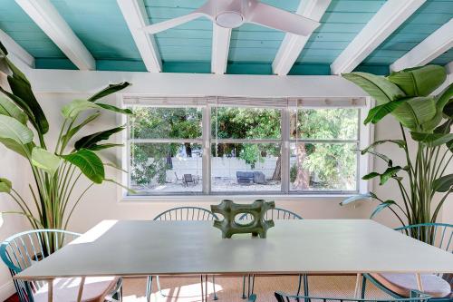 a dining room with a table and plants at Luxury Home in Brickell Miami, 5 min to the Beach! in Miami