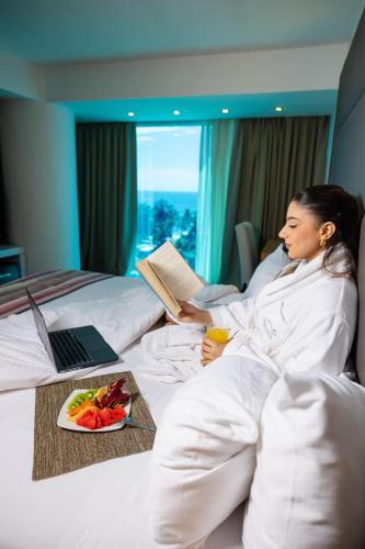 Ένα ή περισσότερα κρεβάτια σε δωμάτιο στο Tibisay Hotel Boutique Margarita