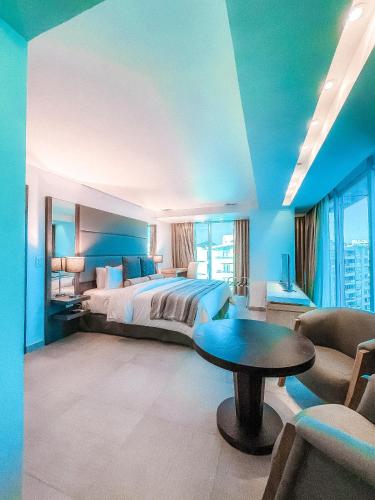 Ένα ή περισσότερα κρεβάτια σε δωμάτιο στο Tibisay Hotel Boutique Margarita